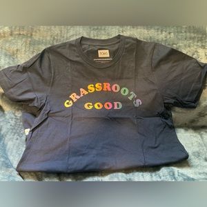 Toms brand, size medium, grassroots good, top